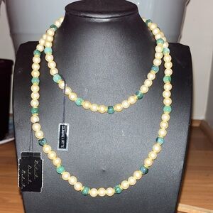 Vintage GENUINE LUCITE emerald and cream necklace, gold bead caps, original tags